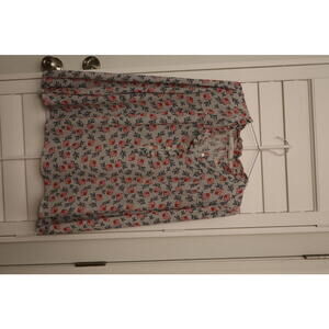 Loft Women's floral long-sleeve blouse with a half-button front, ruffle neckline